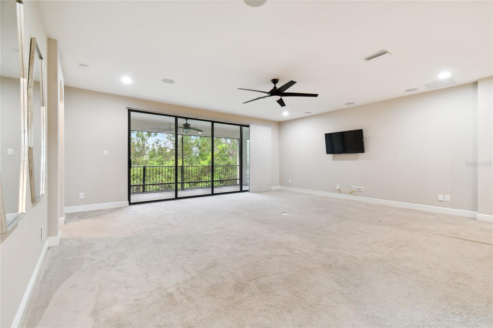 Large Bonus Room with Sliders to the screened in Porch upstairs