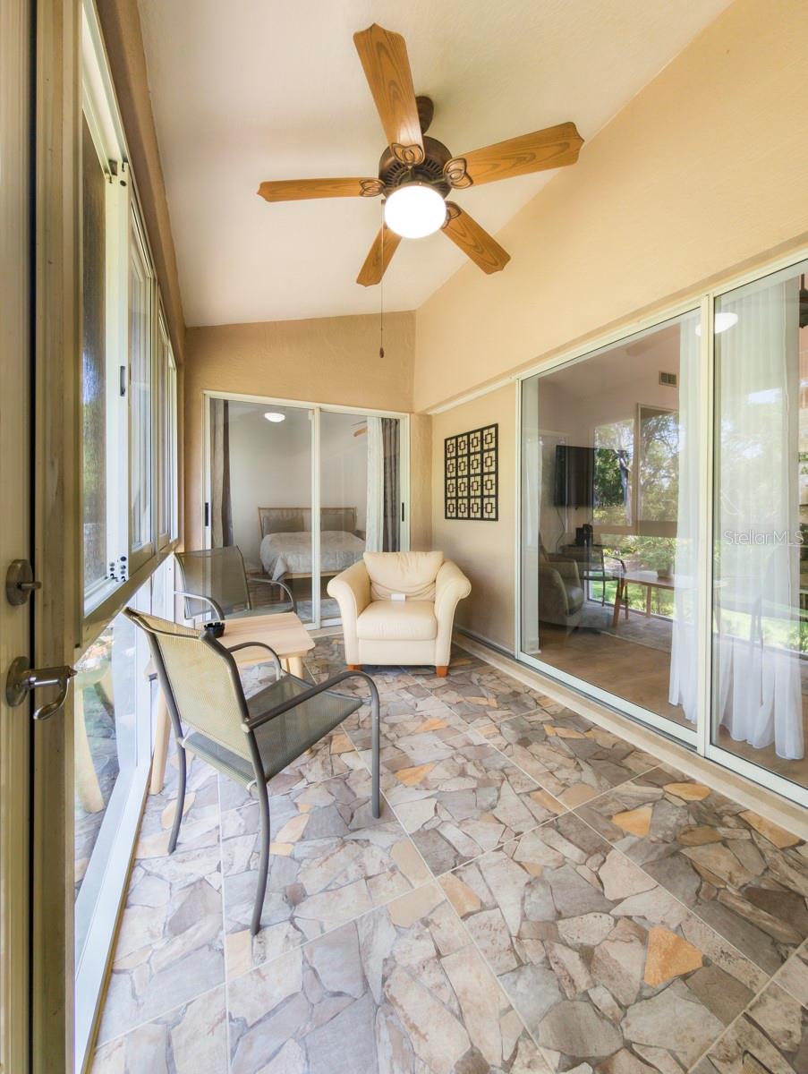 Porch opens to living room and master bedroom