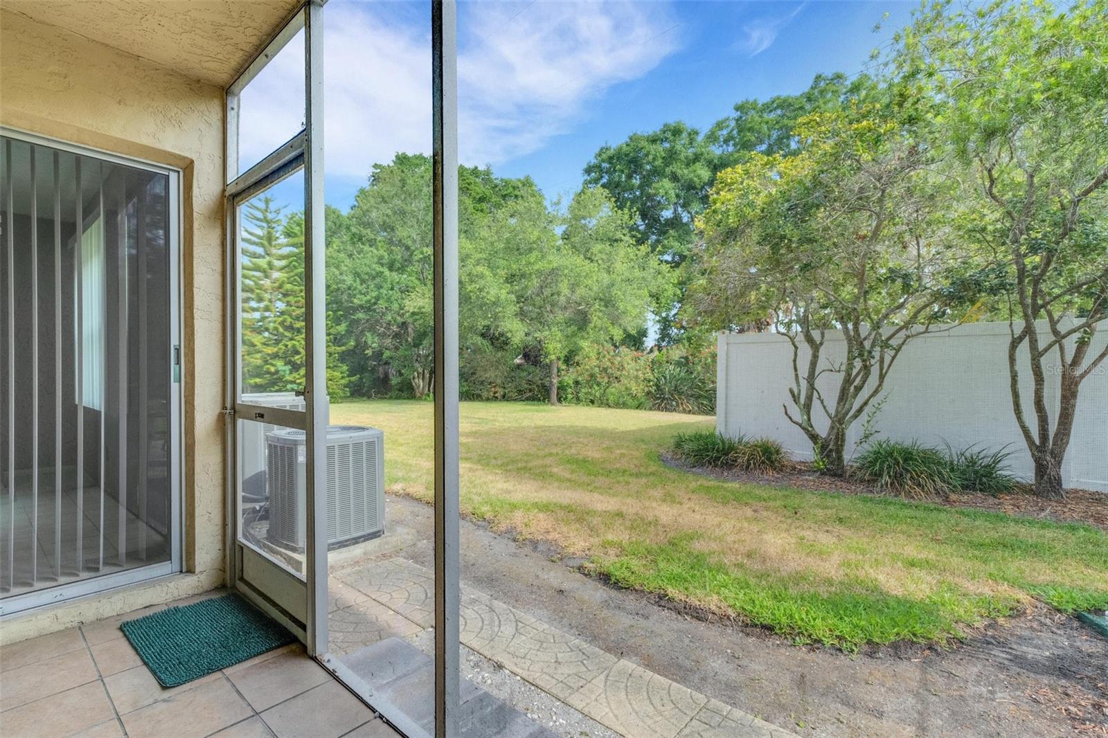 Screened Porch Overlooking Green Space