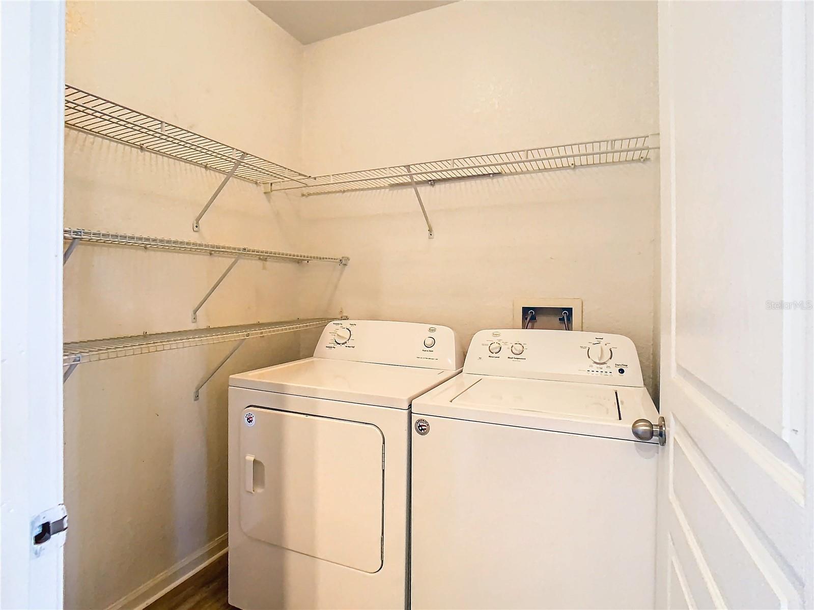 Full laundry room off kitchen. Washer & dryer included.