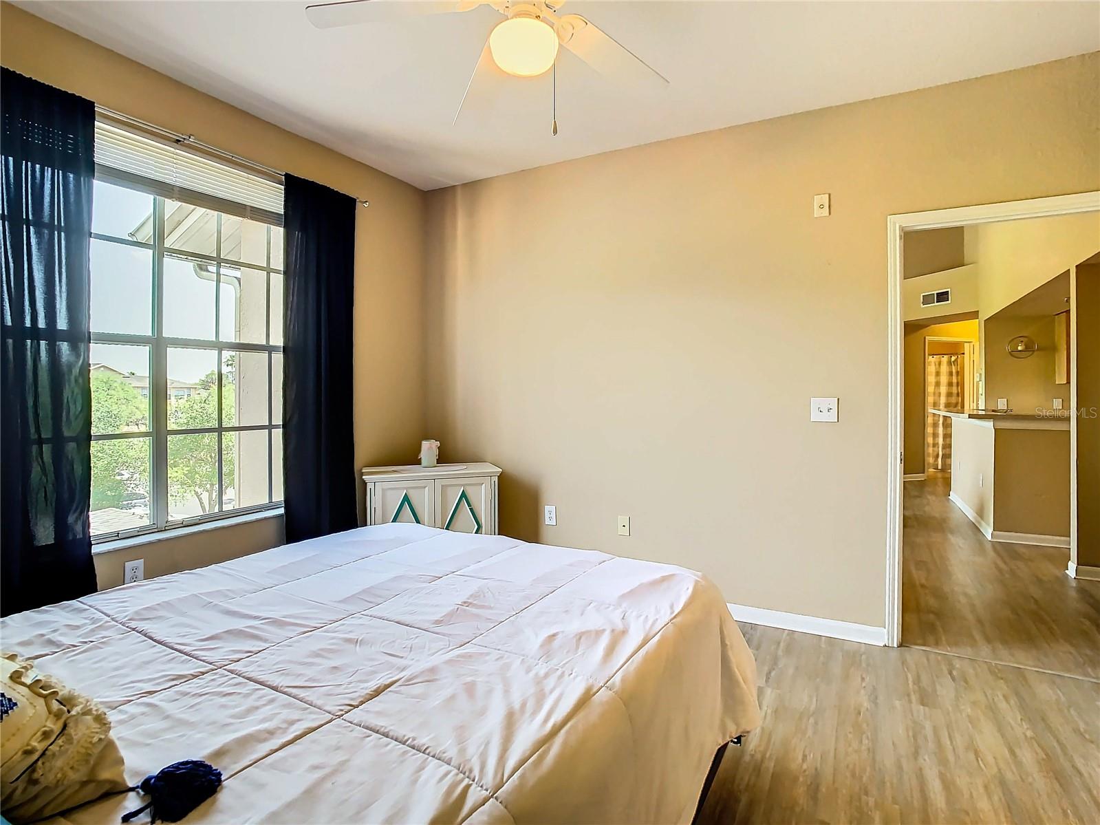 Primary Bedroom. Bath with large walk-in closet to the right (out of view in photo)