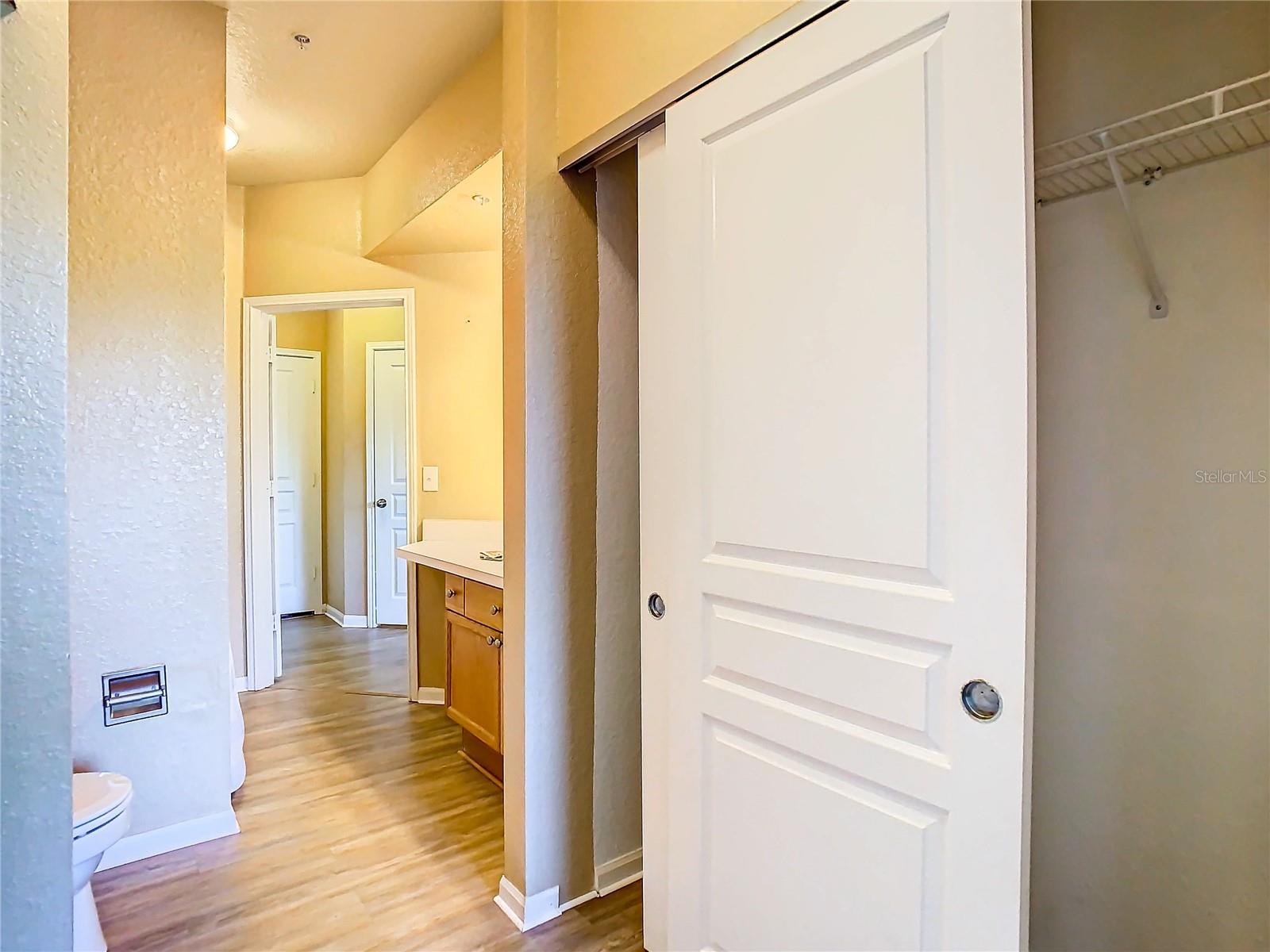 En-suite bath of 2nd bedroom. One of the 2 closets