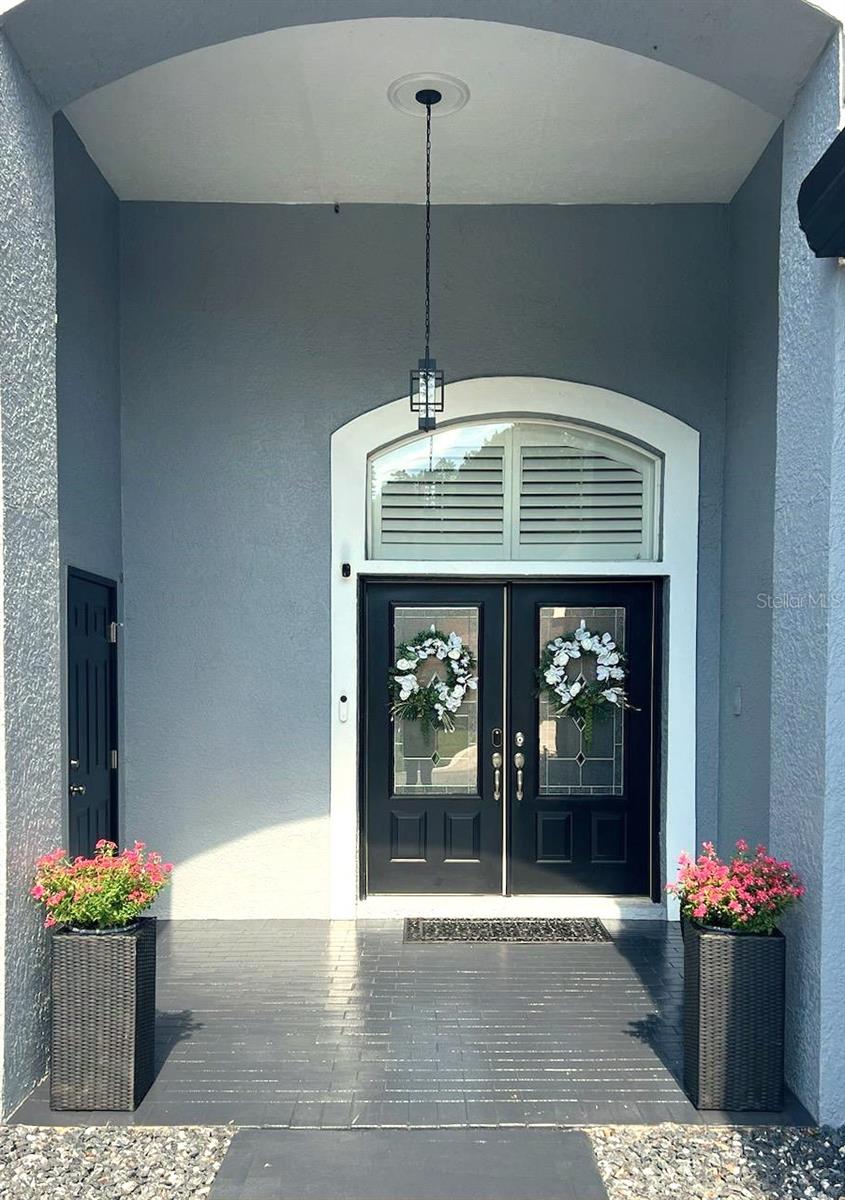 Grand double Door Entrance. View also showing the private entrance (left) to the guest room with ensuite. Welcome home to you and your guests!