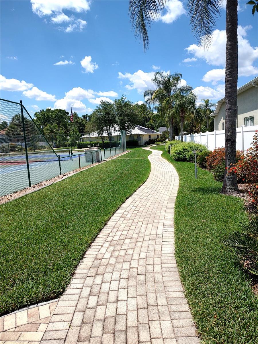 Oasis Community one of many walkways to Clubhouse, Gym and Pool