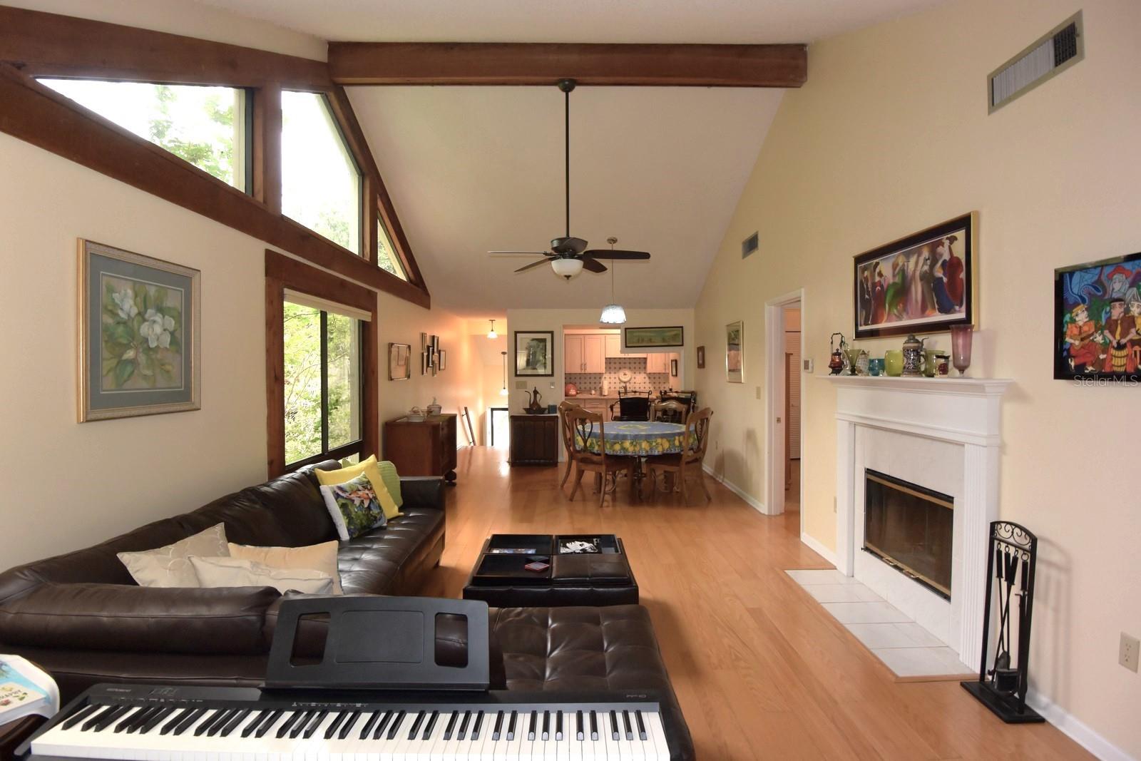 Great Room with Cathedral Ceilings & Real Wood Flooring