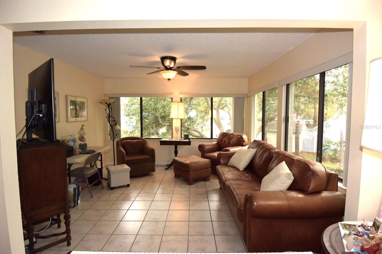 Florida Room with Waterfront Panoramic Views of Two Water Fountains