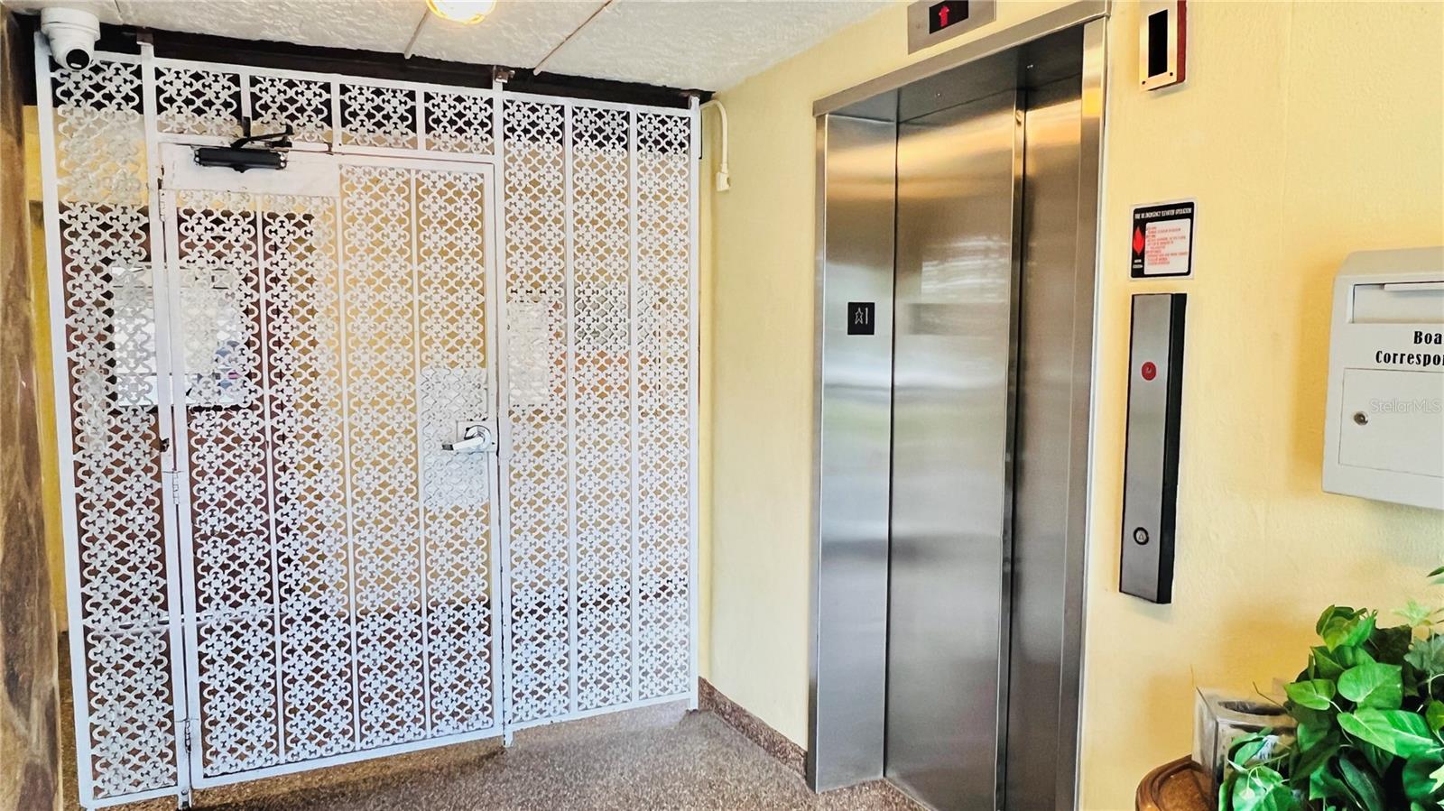 Gated entry to elevator