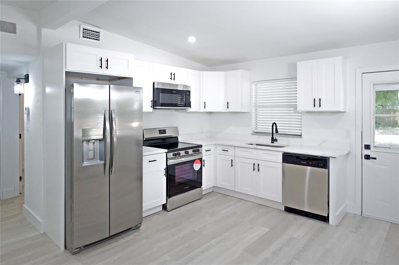 Updated & Remodeled Kitchen Features Stainless Appliances