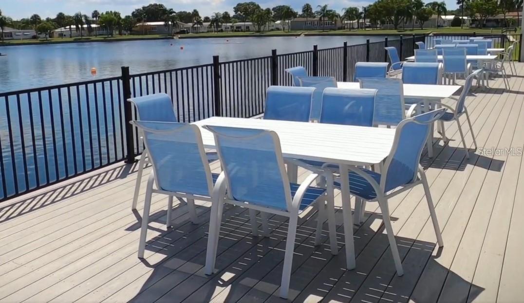 Club house outdoor seating overlooking the lake