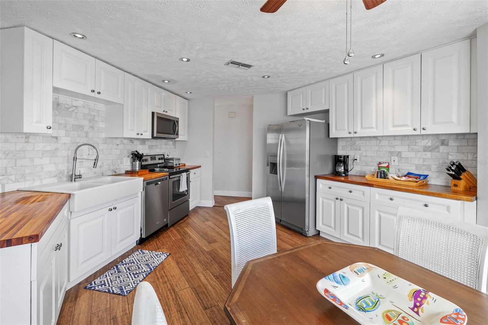 Kitchen with stainless steel appliances.