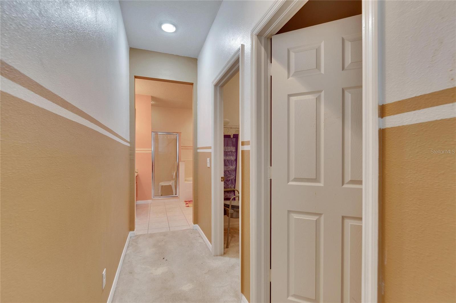 His & Hers Walk-In-Closets and En Suite Bathroom