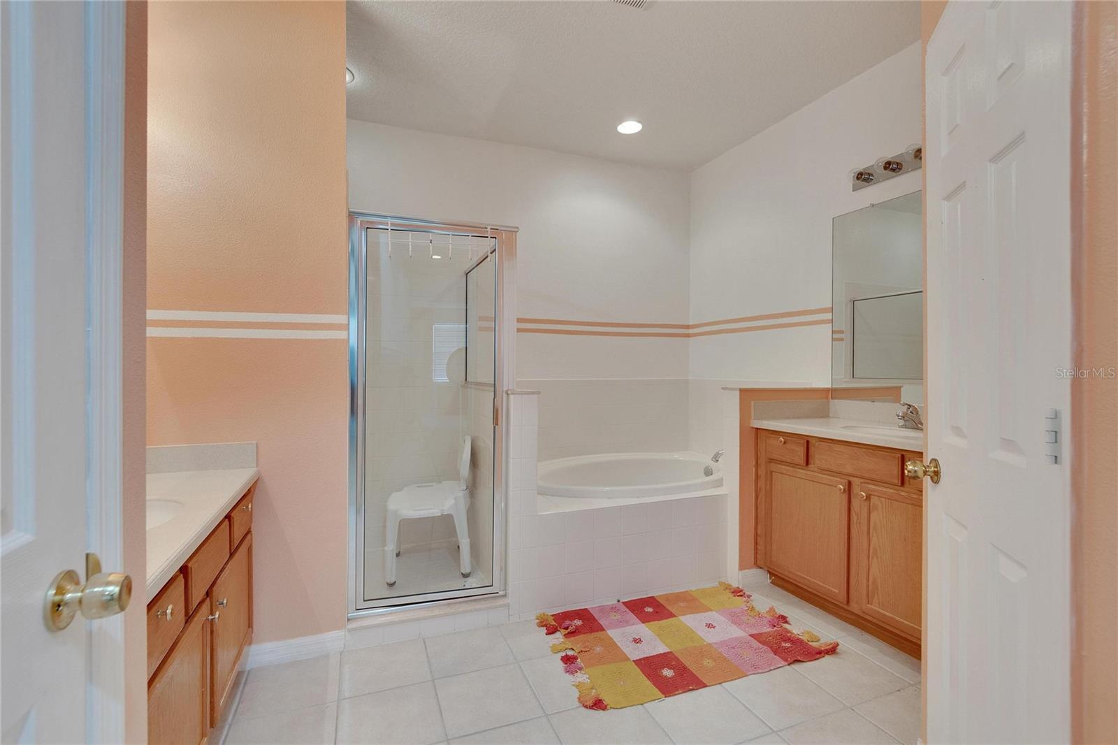 Primary En Suite with Split Vanities, Tub w/Separate Shower Stall and Private Water Closet
