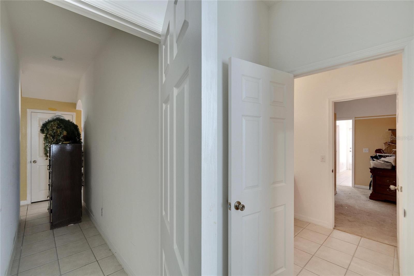 Separate entry way into Bedroom (3) [Linen Closet across the hall off the kitchen]