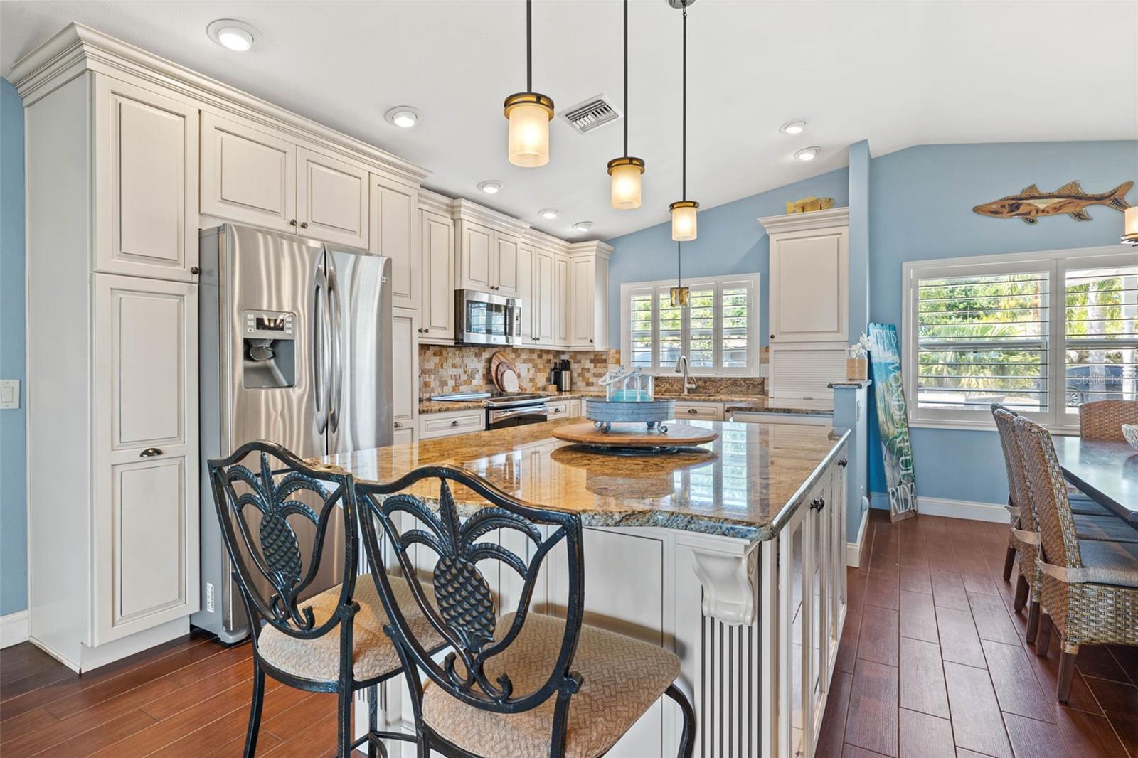 High ceilings, light and bright and KraftMaid custom cabinetry!