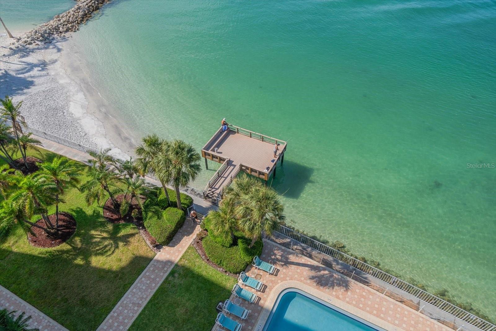 Views from balcony looking down to Private Pier and Private Beach