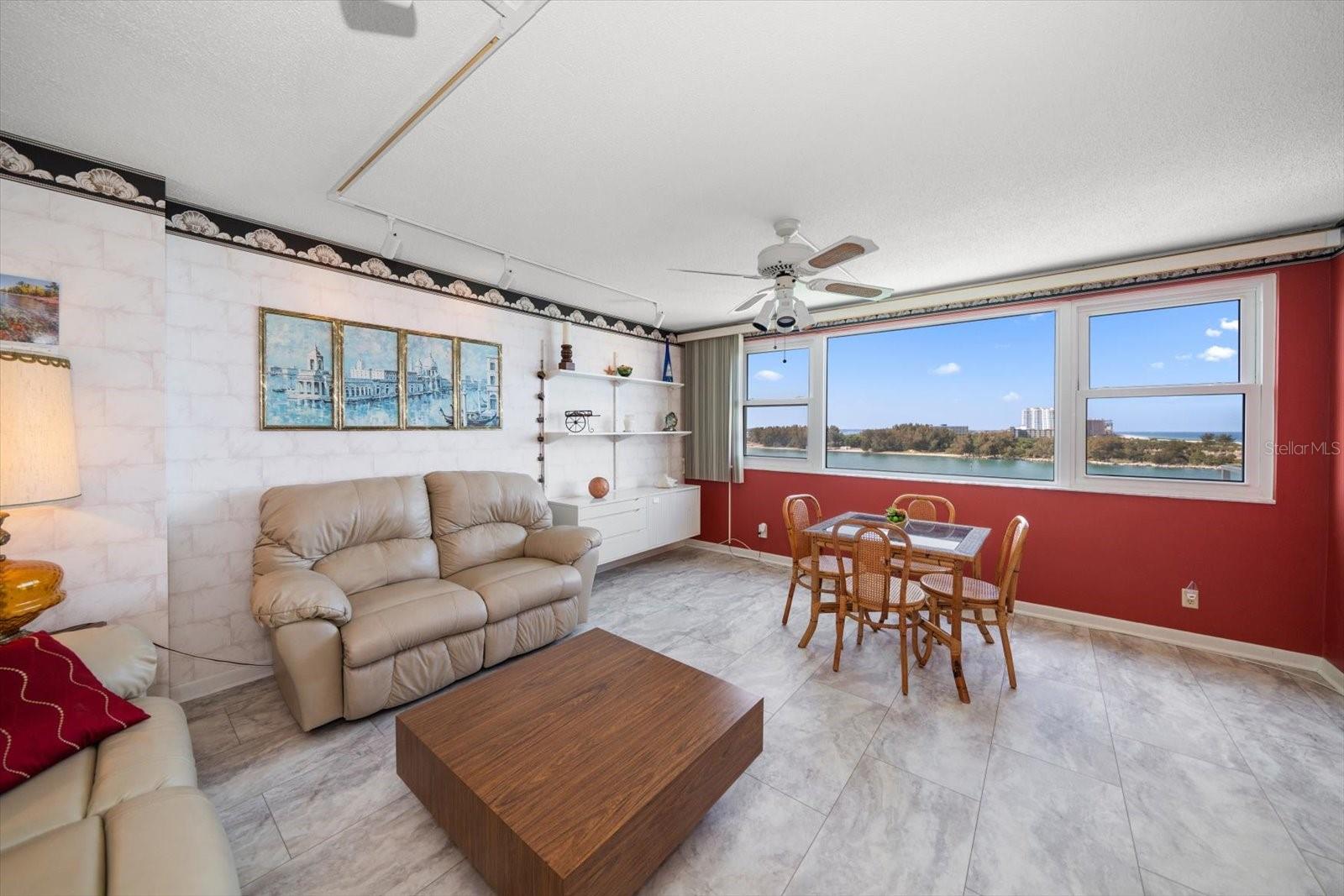 2nd bedroom space converted into more living space with open floor plan to kitchen and living room.