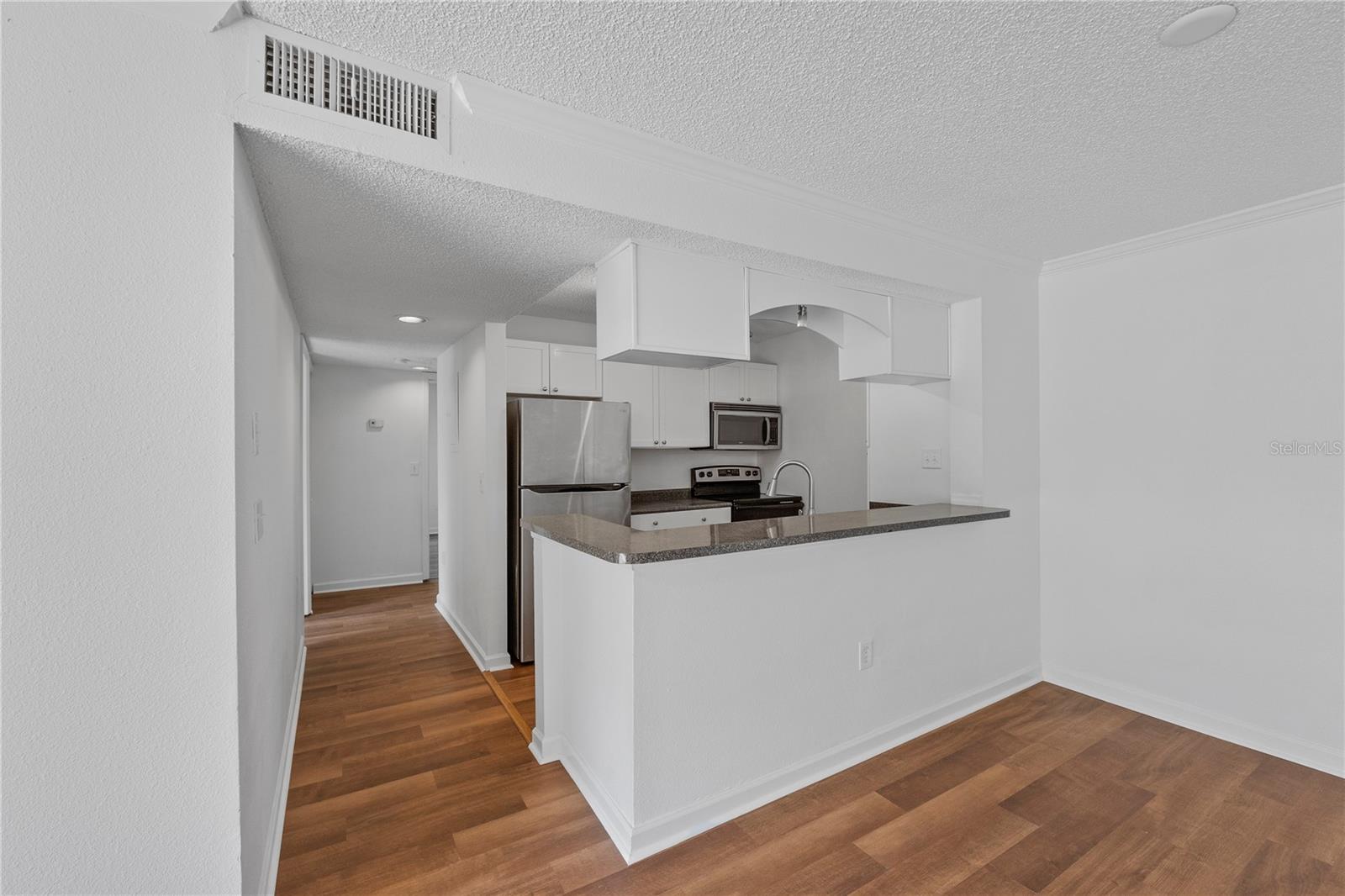 Kitchen opens to Dining Room