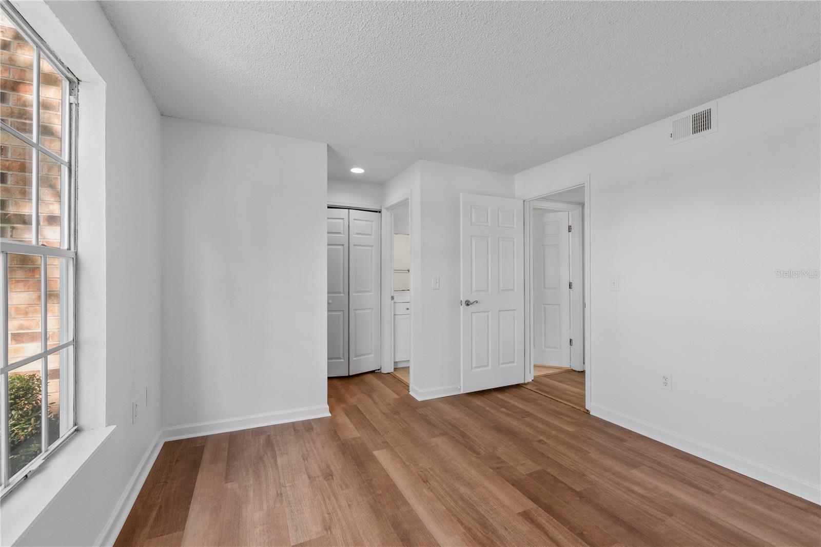 Main Bedroom with Large Walk in closet & Linen closet