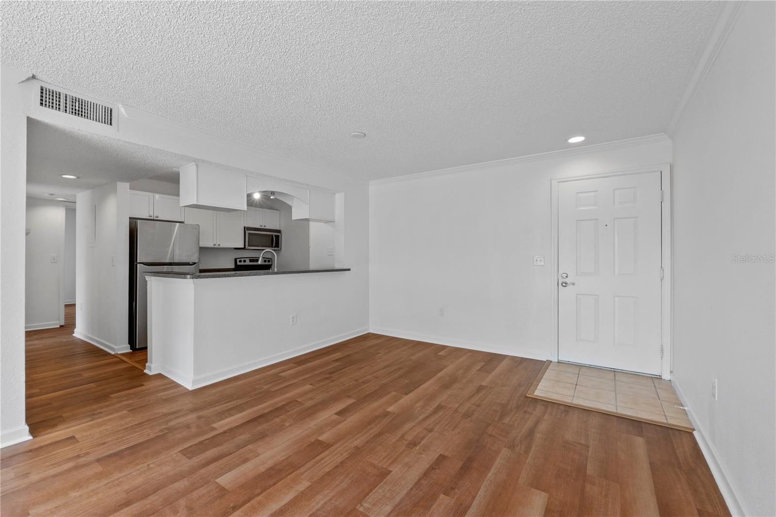 Open floorplan with Dining Room/Living Room just off of the Kitchen