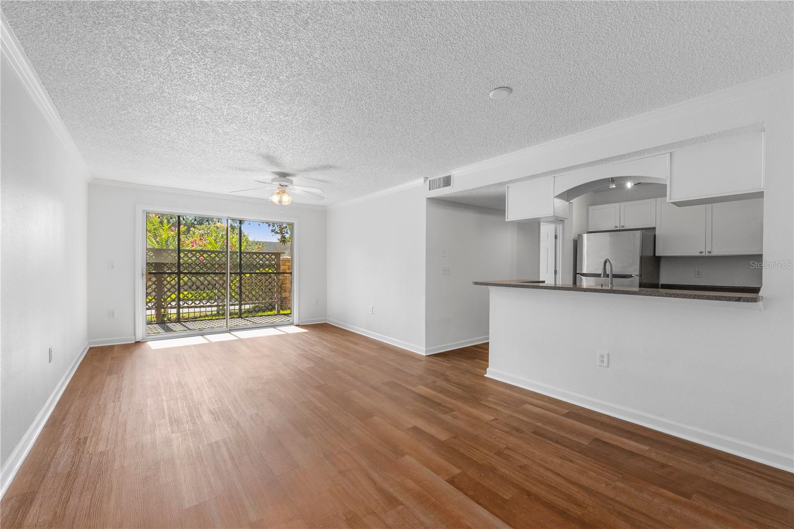 Lots of natural sunlight enters into this garden condo