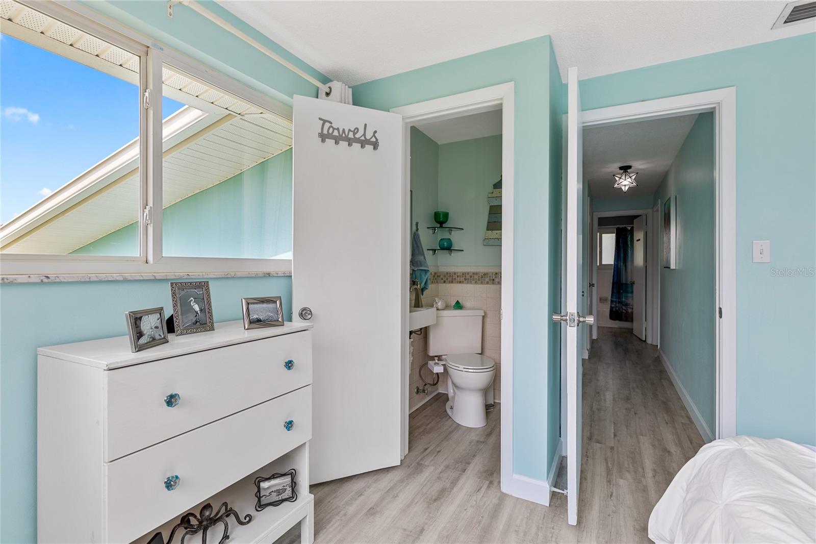 Bedroom 2 features it's own HALF Bathroom