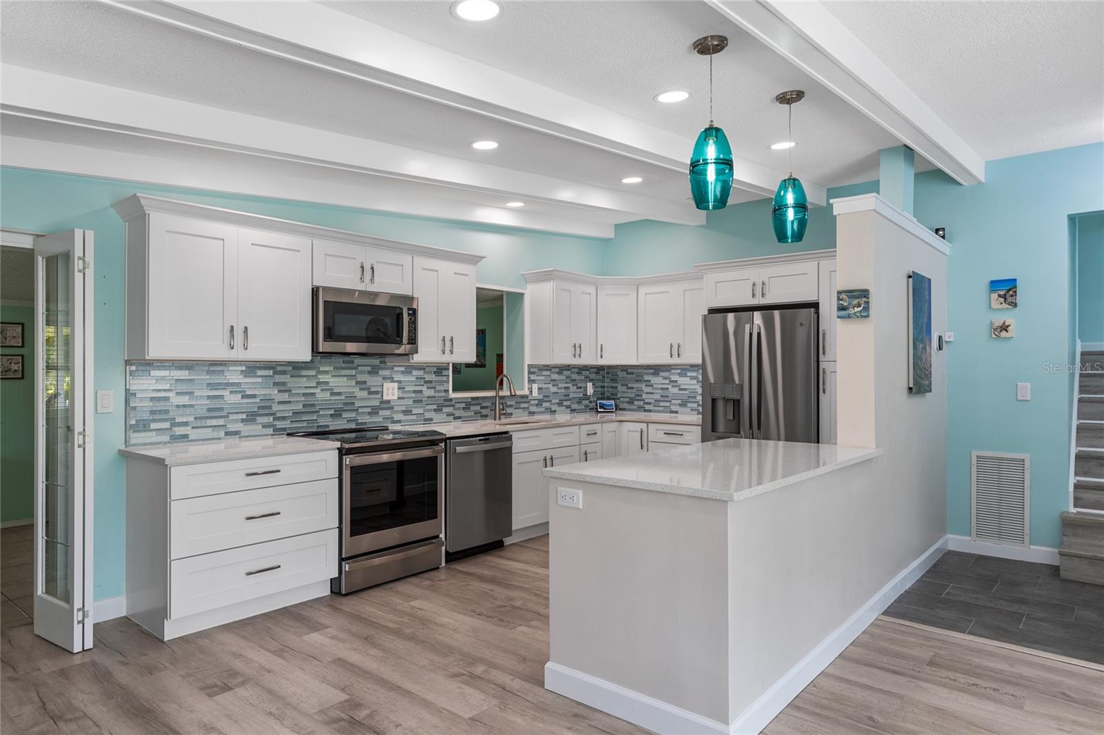 This Kitchen was meticulously updated and is going to be a delight to prepare meals in and entertain.