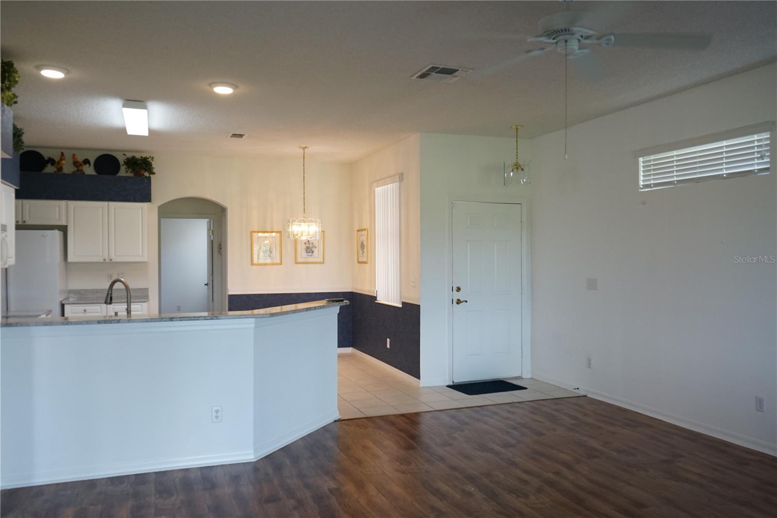 front door and kitchen