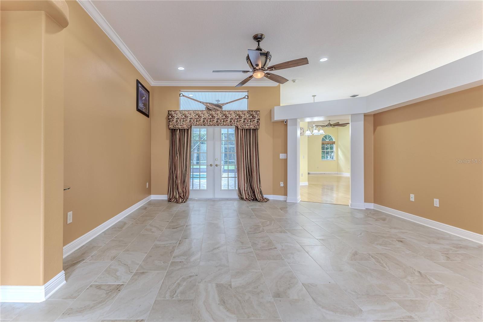 Formal Living Room to Family Room, Nook & Kitchen Area