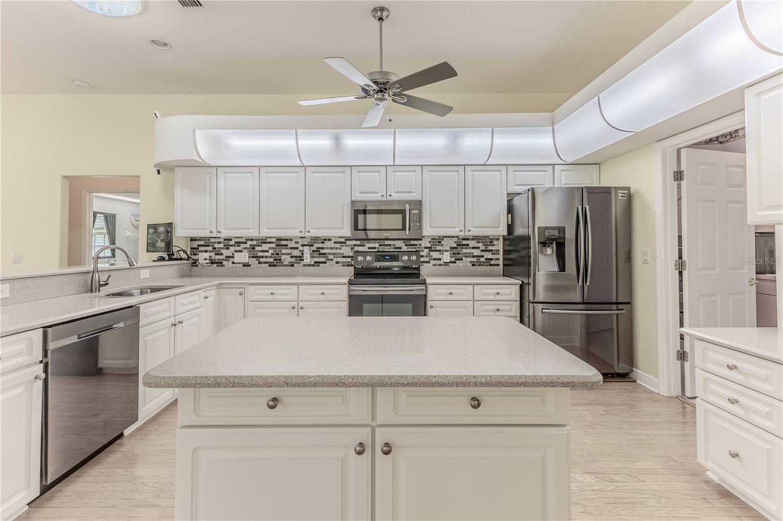 White Cabinets & Corian Counters