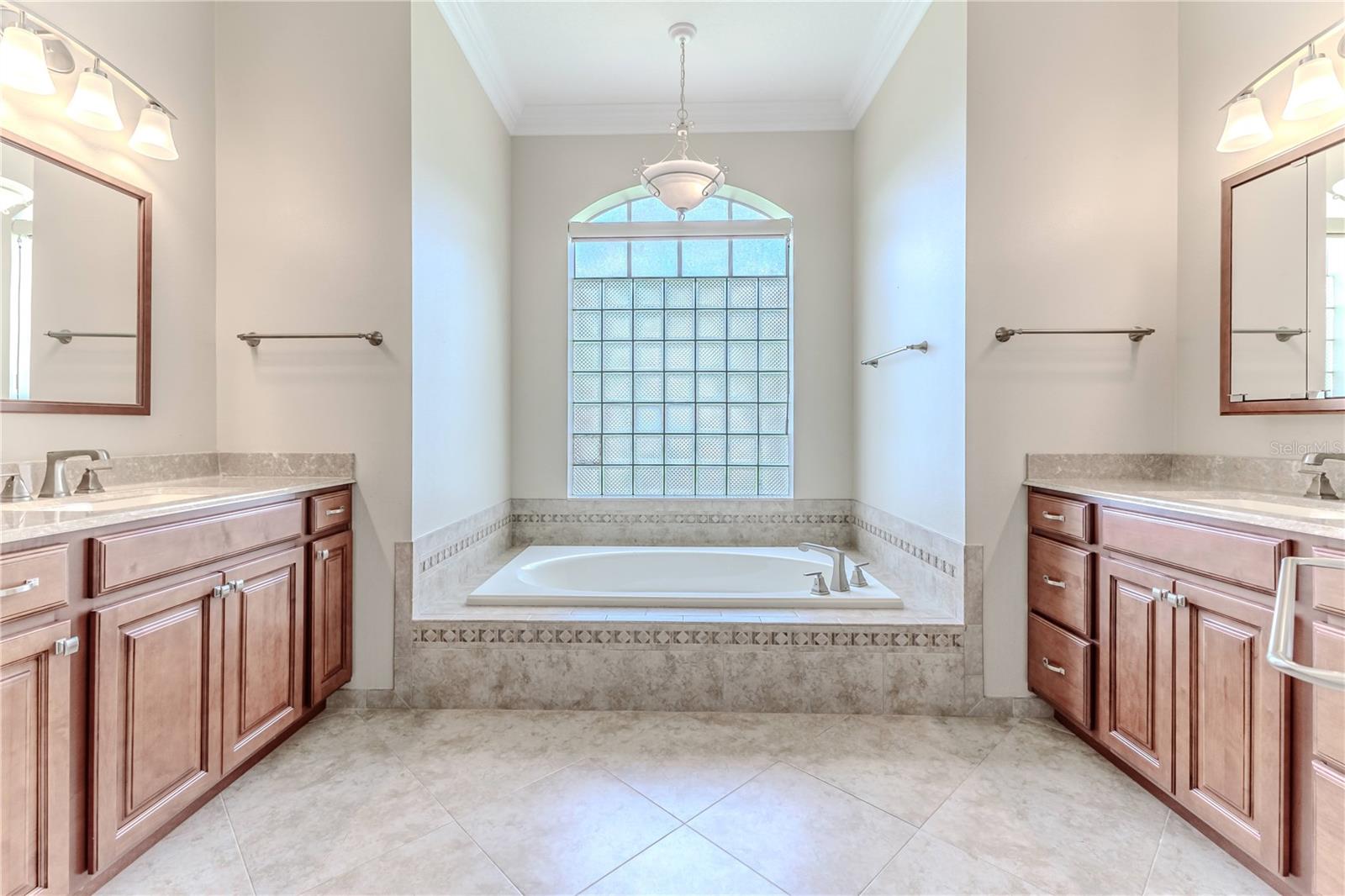 Soaking Garden Tub with His and Her's Separate Taller Vanities