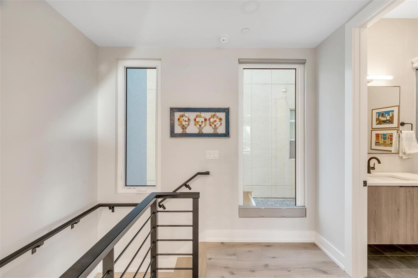 Second floor landing and half bathroom.