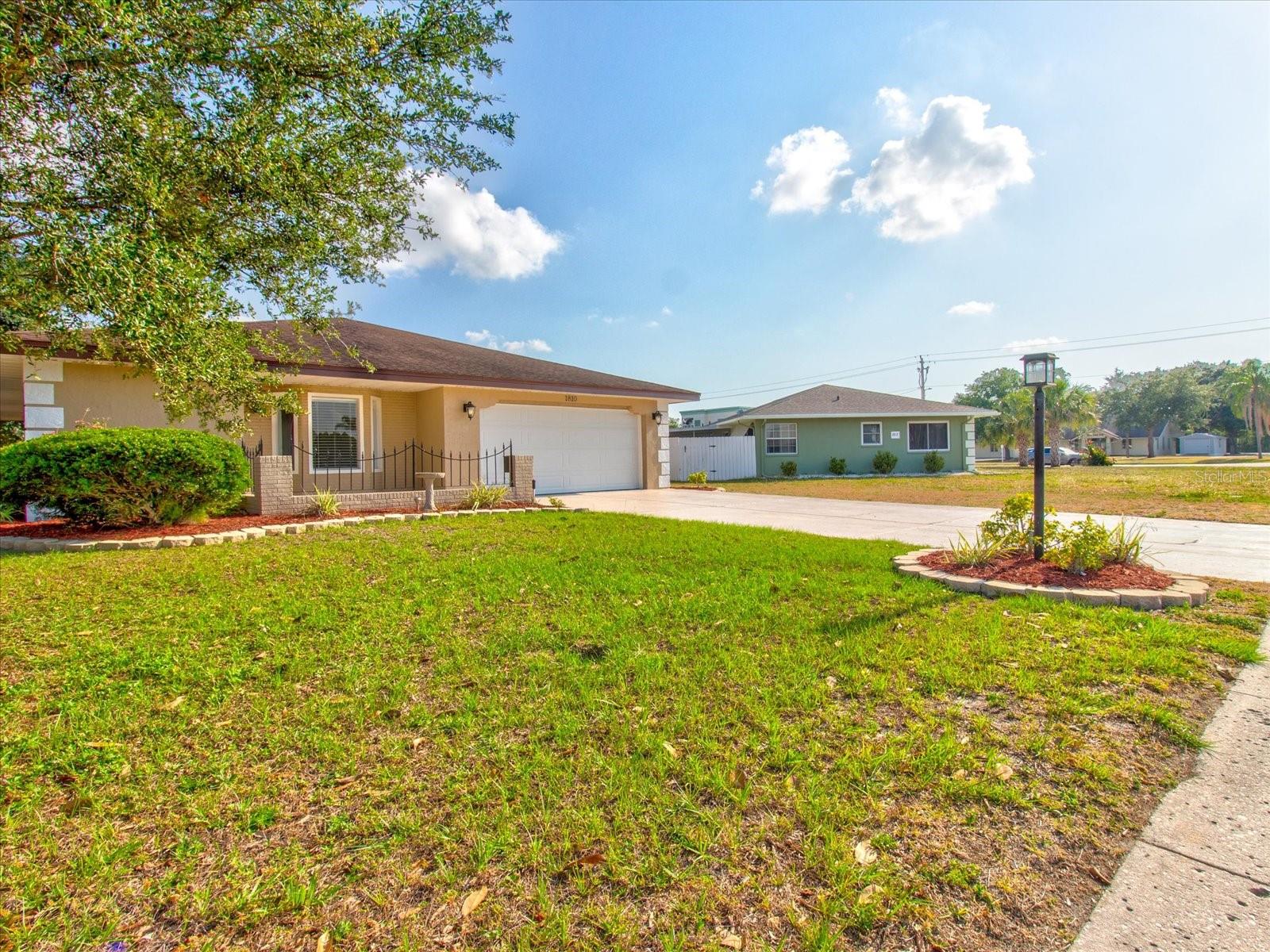 View from front left Corner of the home..Spacious yard on all 4 sides