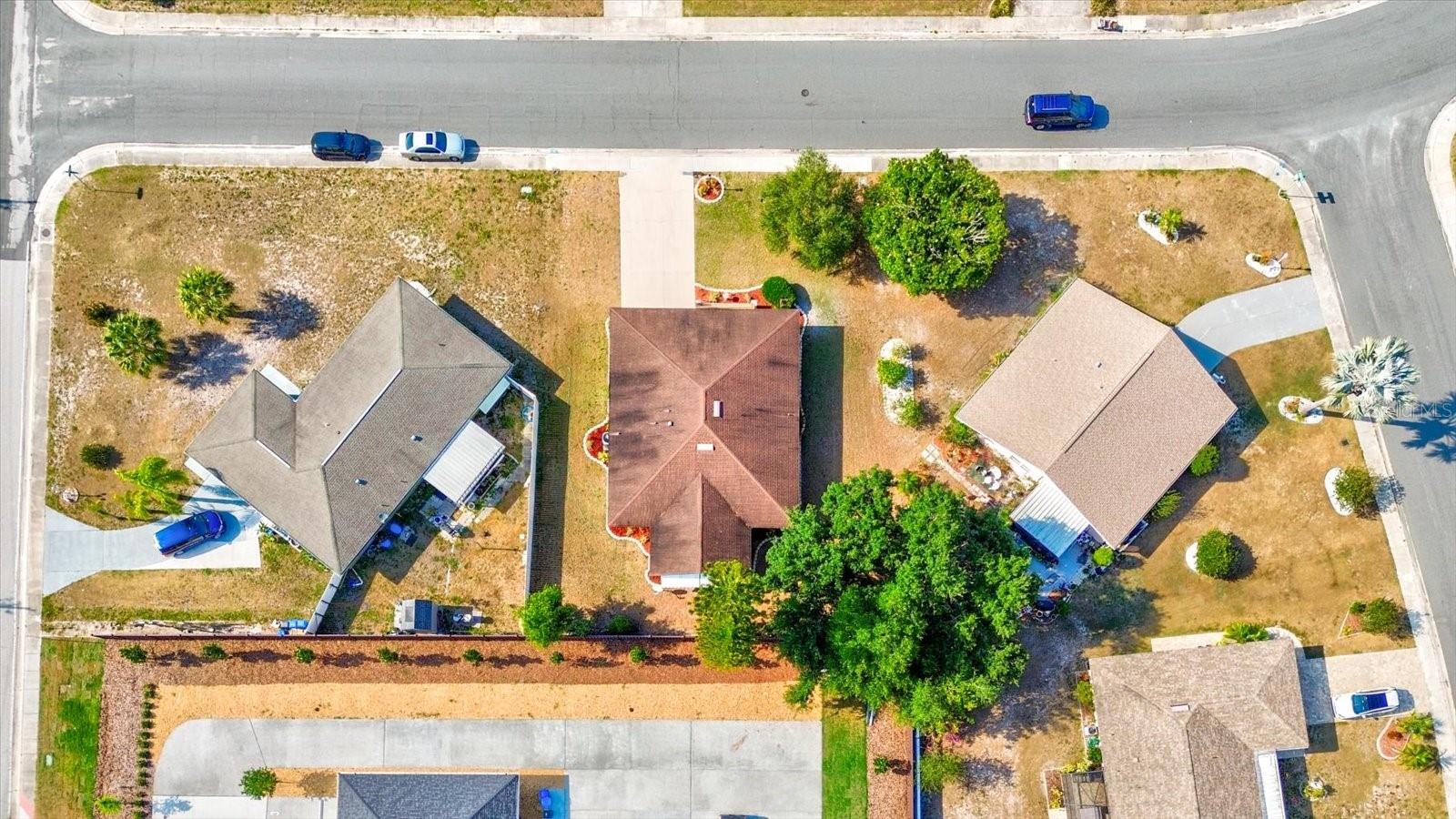 Subject Home aerial shot from the back; home in the middle