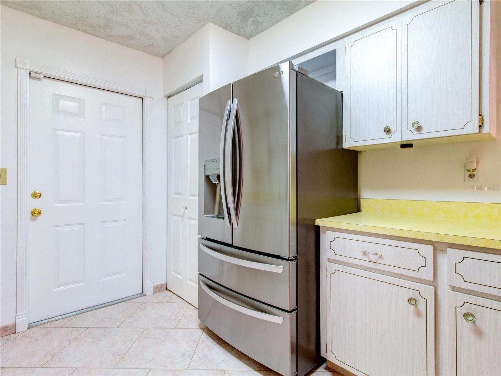 opposite side of Kitchen with exit to the Garage