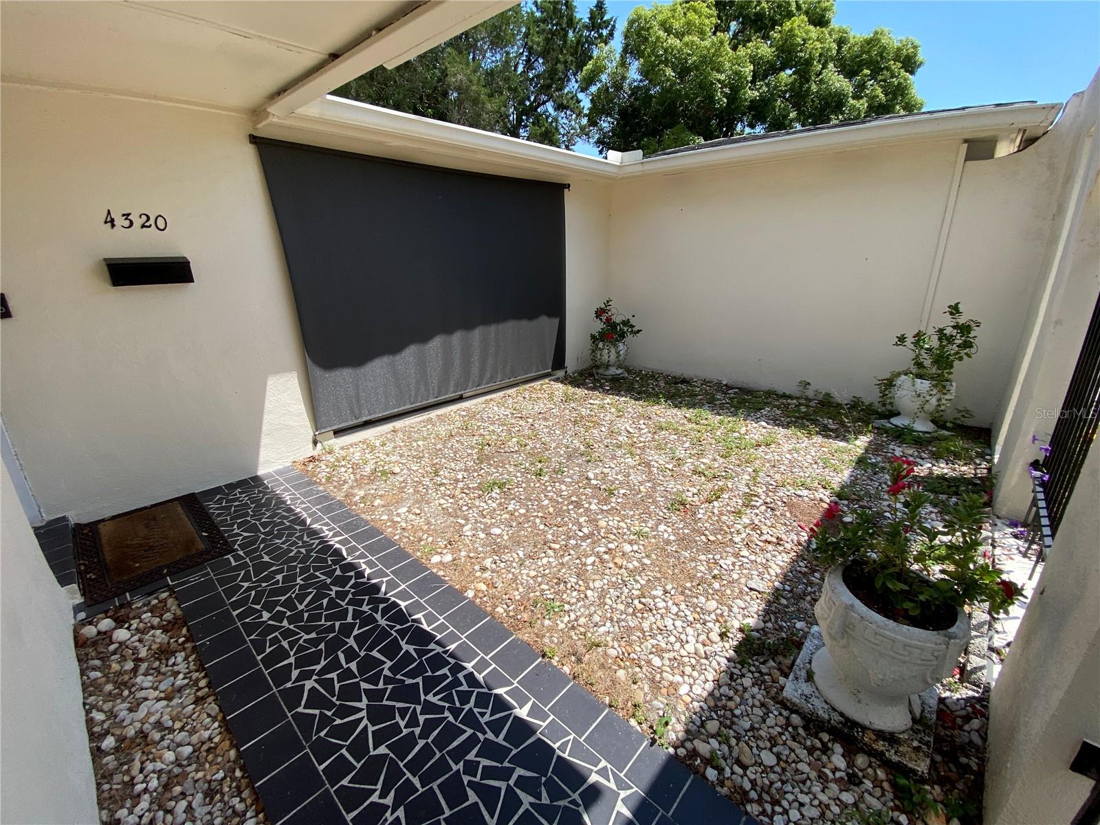 Front door gated green space