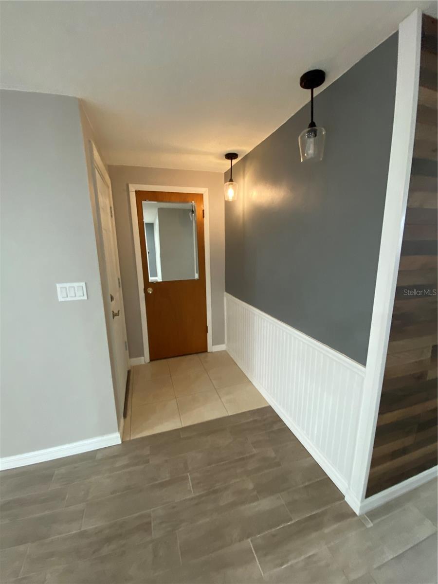 Front door entry area with closet