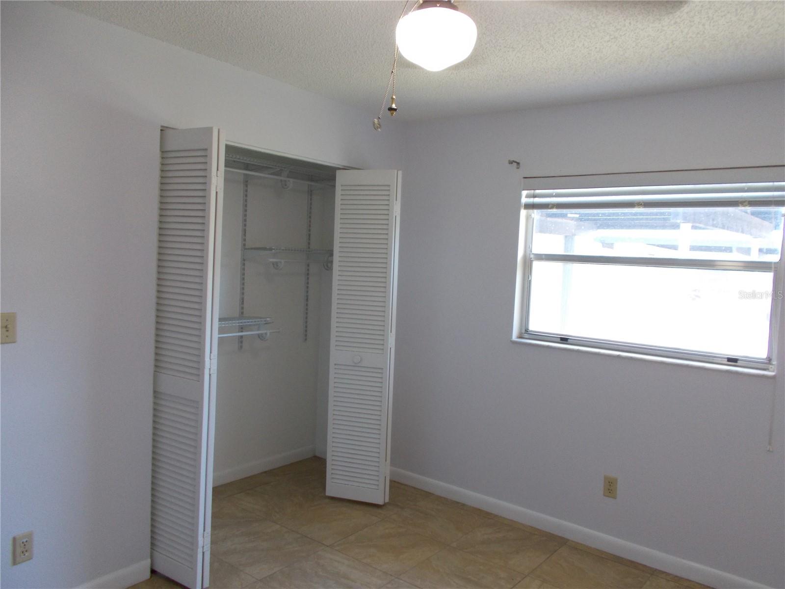 The Guest Bedroom showing the built-in closet.