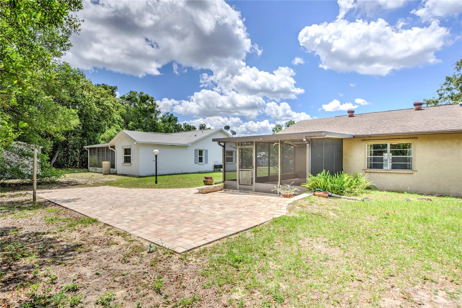 Large backyard with patio