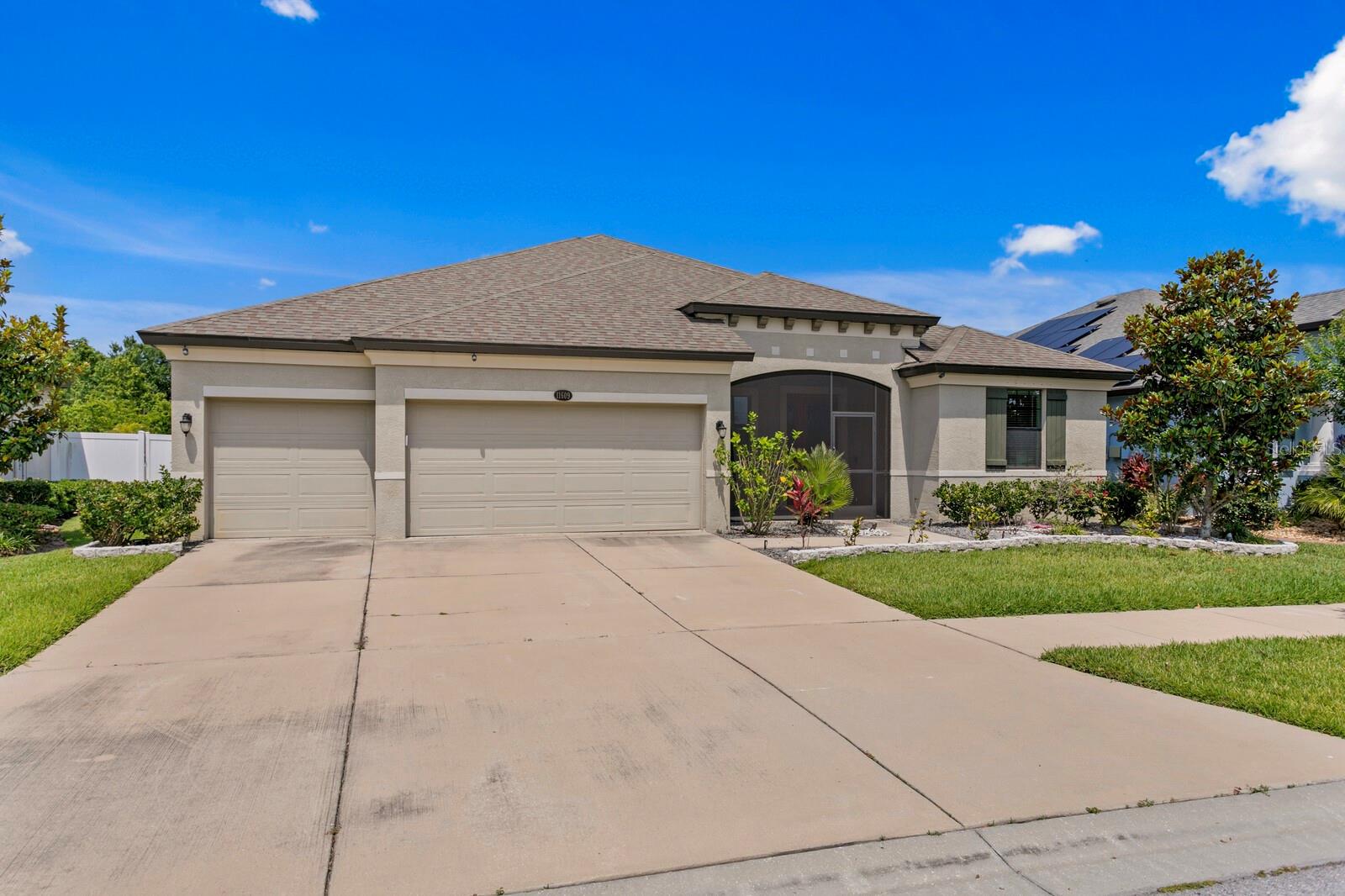 The oversized 3-car garage provides plenty of parking space