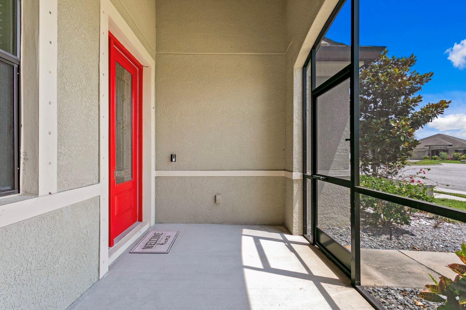 The owners added a screened enclosure to the front porch