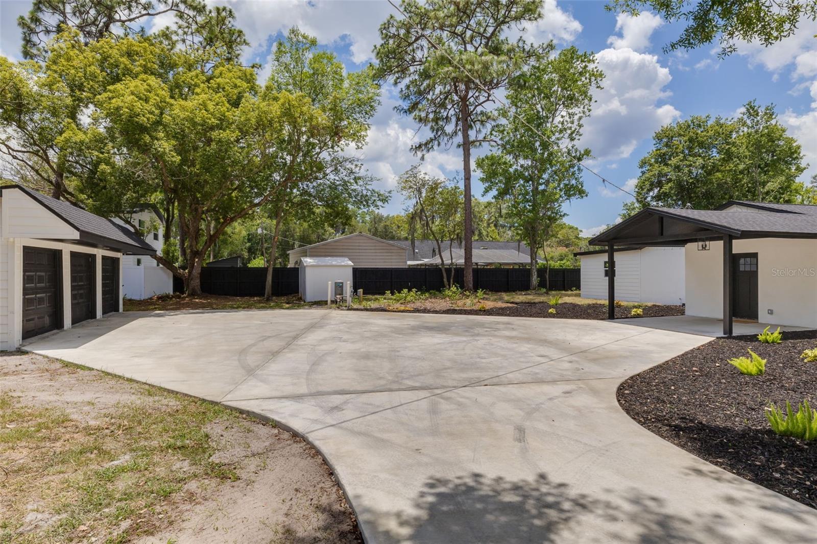 Brand new driveway leads to detached 3-car garage!