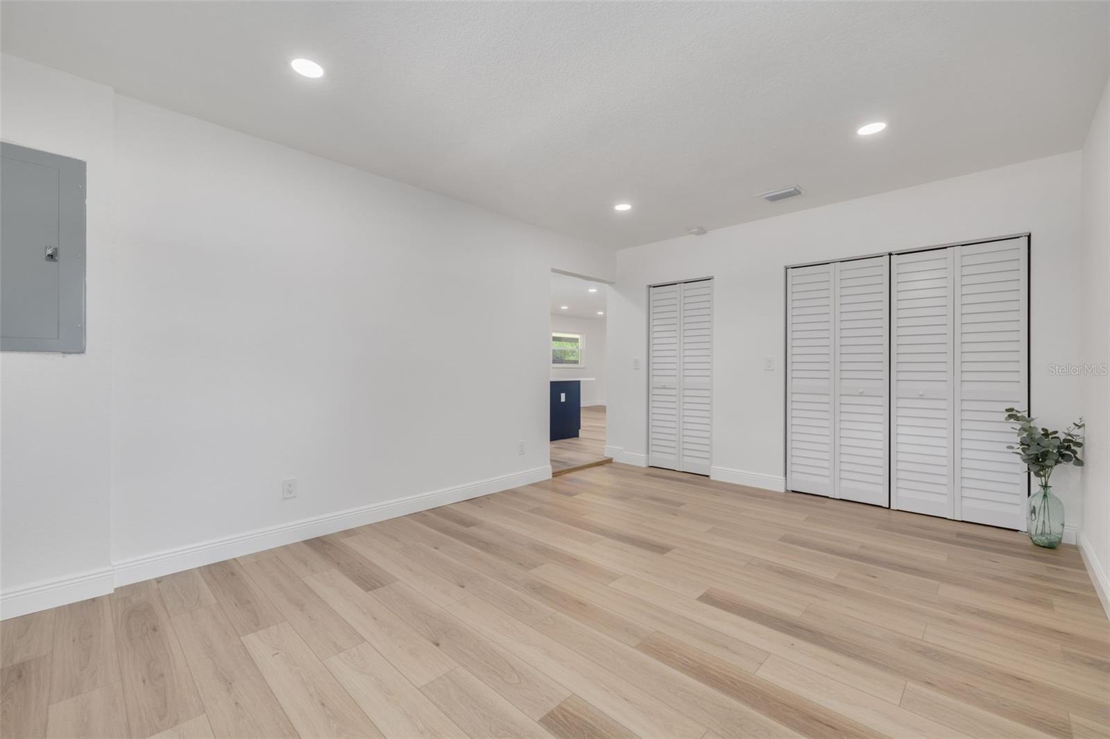 Family room, kitchen is through door on left; washer/dryer hook-ups in closet; coat closet