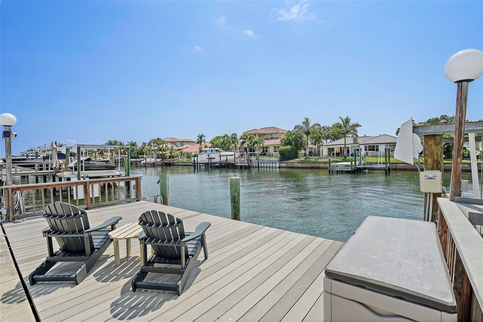 Dock with 13k boat lift. Vinyl seawall