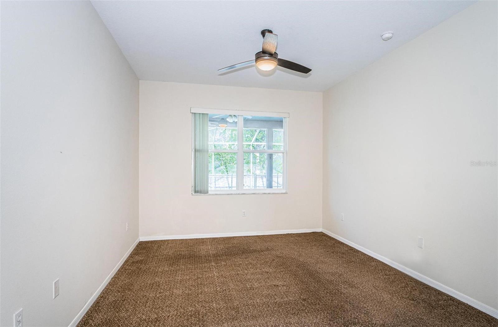 Master bedroom with ceiling fan