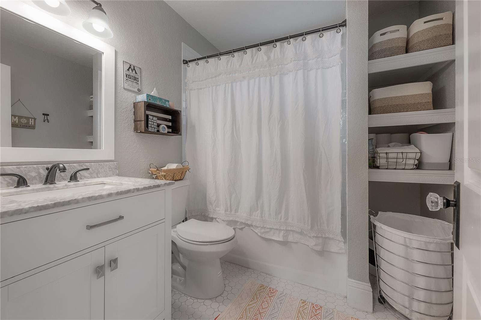 Guest bathroom with bonus storage