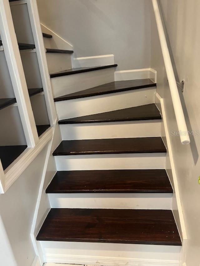 Nice wood stairs up to second level