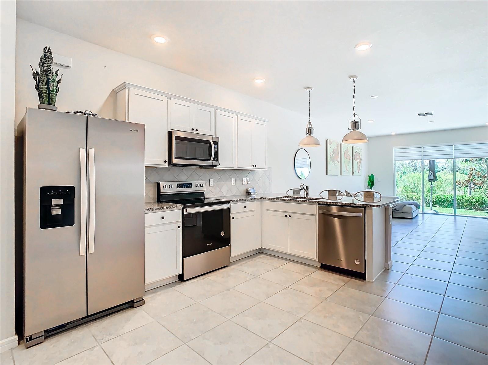 Open plan kitchen overlooking great room