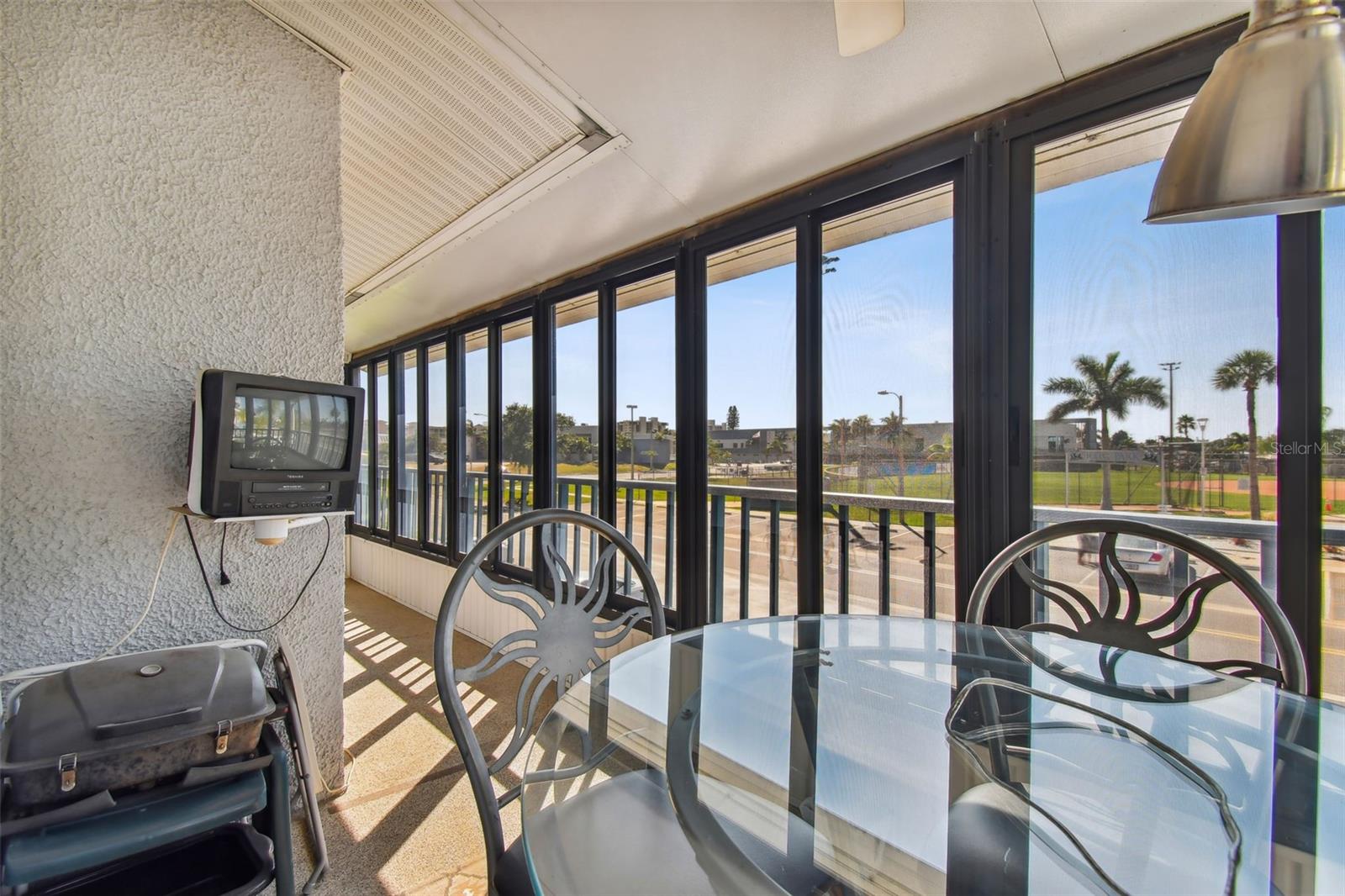 Dining Area on Enclosed L Shaped Balcony