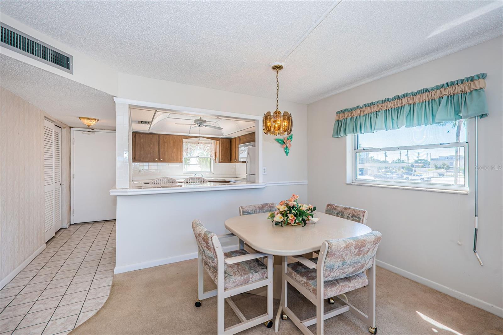 Dining area looking into kitchen