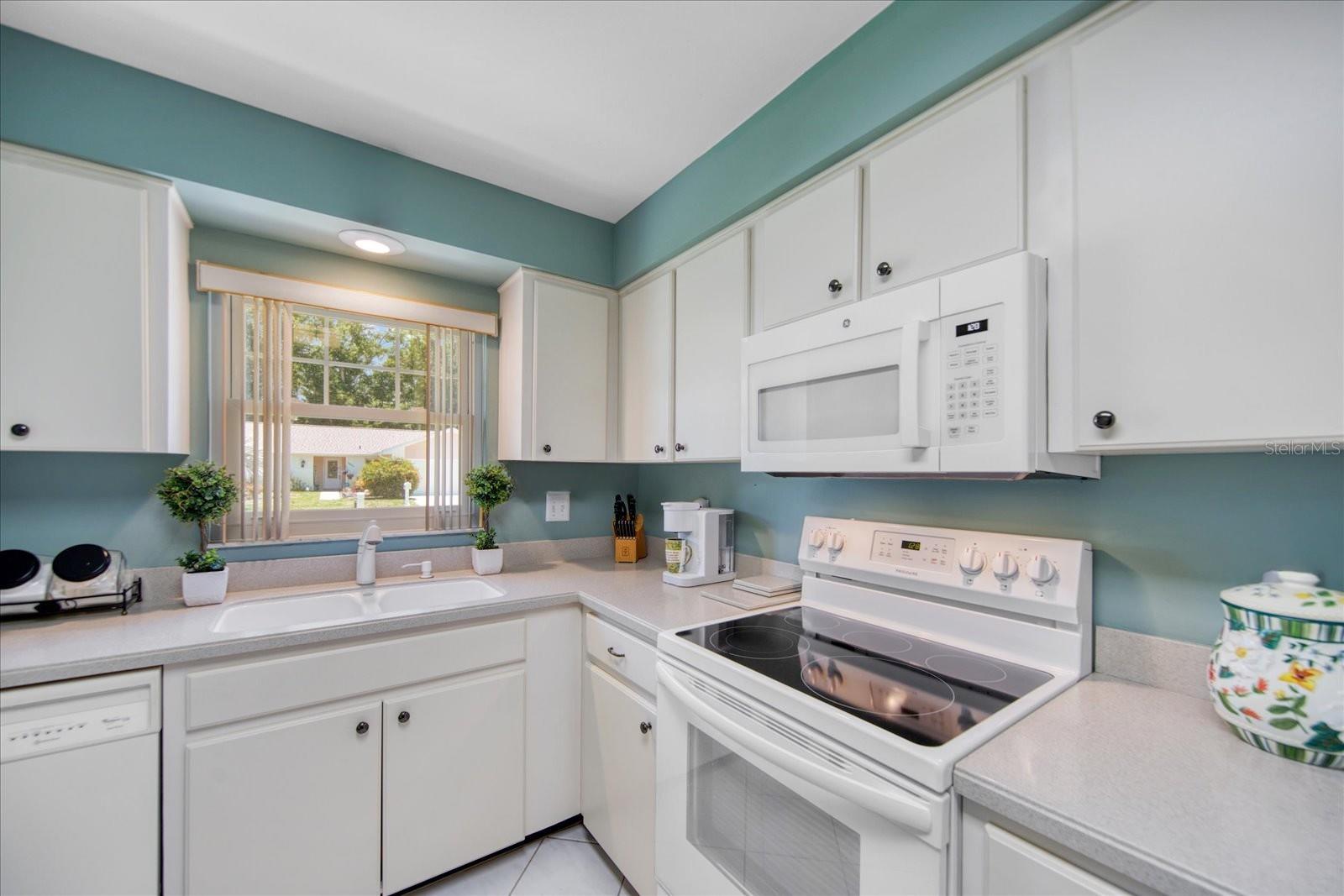 Updated Corian counters & matching white appliances~